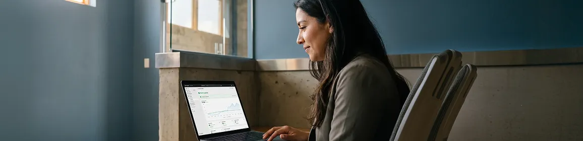 Operations manager calmly reviewing a healthy Shopify store with all systems operational and 99.9 percent uptime Operations manager calmly reviewing a healthy Shopify store with all systems operational and 99.9 percent uptime
