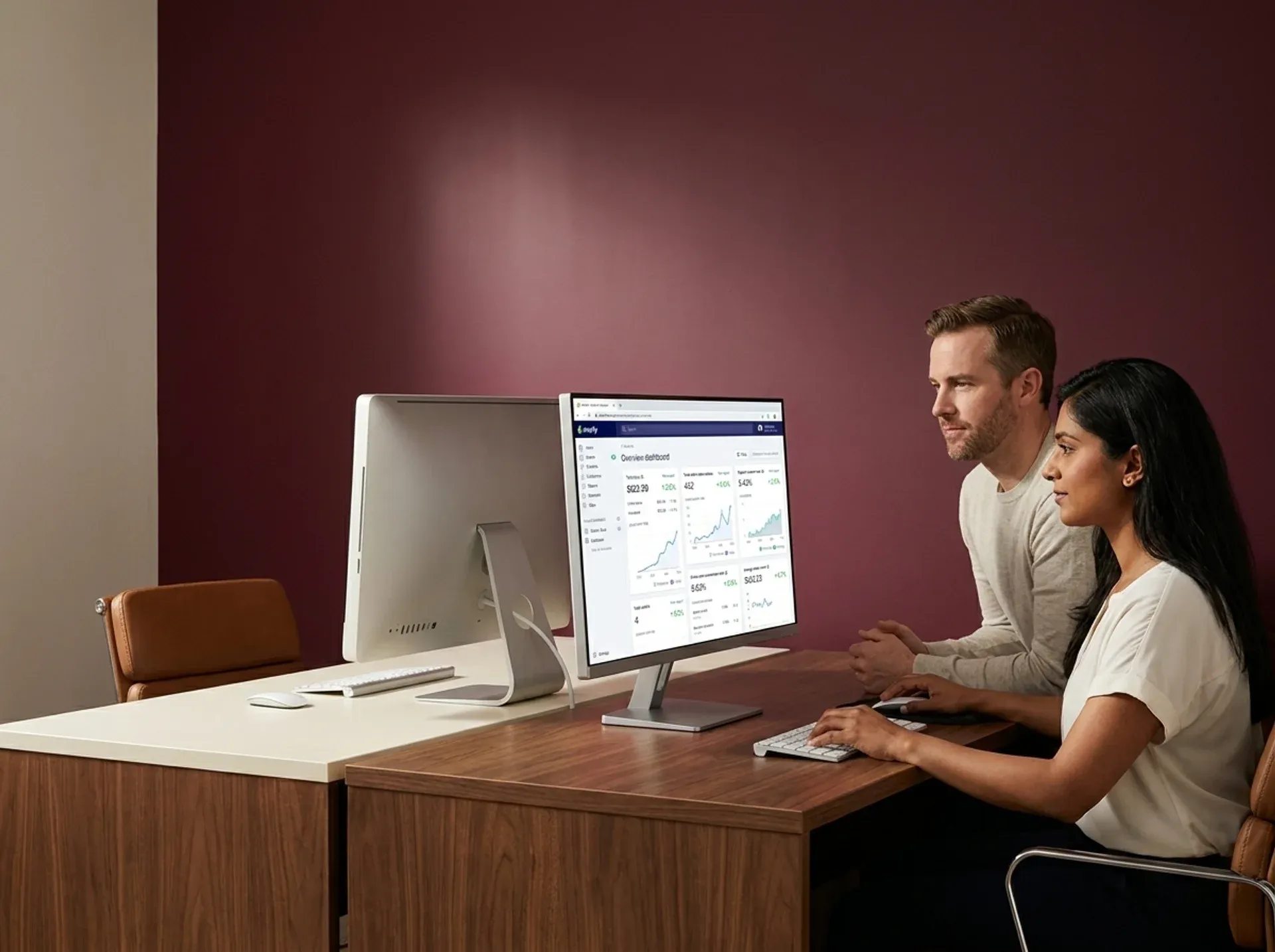 Shopify emergency engineer team providing urgent technical support, focused at screens in collaborative workspace Shopify emergency engineer team providing urgent technical support, focused at screens in collaborative workspace