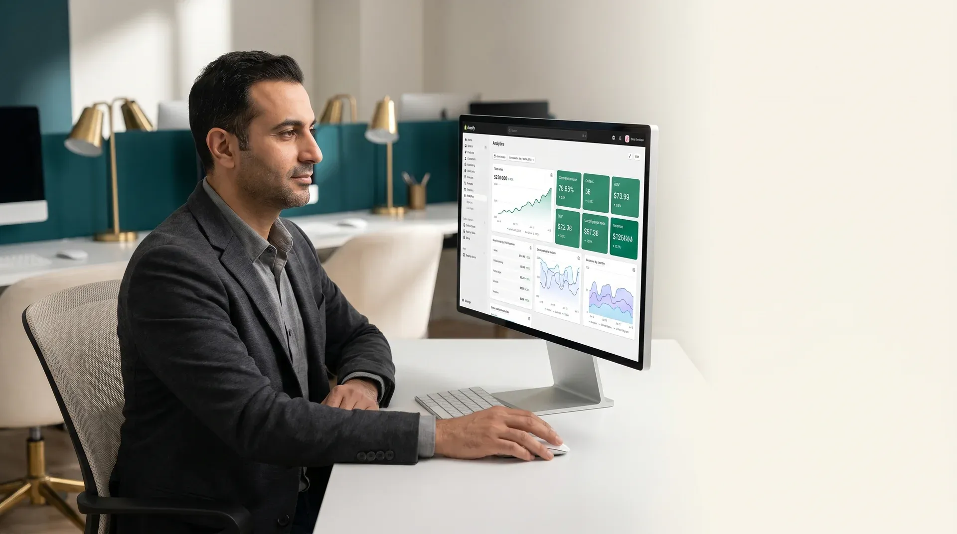 Enterprise ecommerce director reviewing Shopify Plus performance and revenue growth data after successful Magento to Shopify replatforming engagement